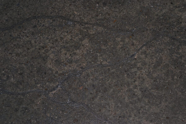 Random crack repairs with DiamaKrete Mortar, colored with dye